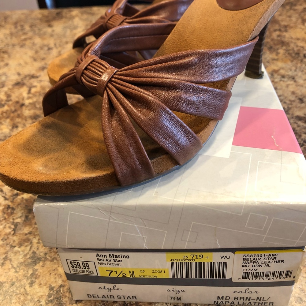 Slip in leather sandals.